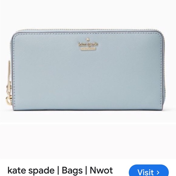 kate spade Handbags - Kate Spade Blue and Gold Wallet